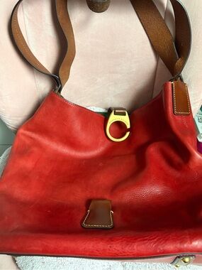 Dooney & Bourke Red Leather Hobo with Brown Trim and Gold Hardware